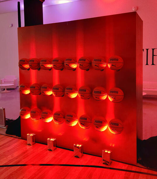 Wall with basketballs on display